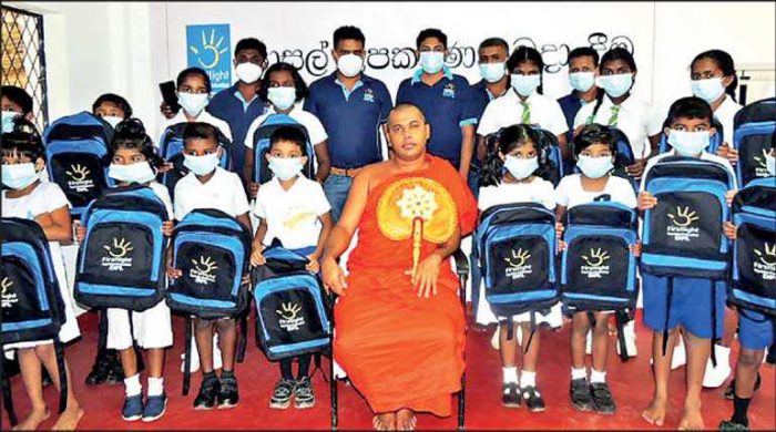 DPL Firstlight Donates School Bags to Monaragala Rubber Farming Communities